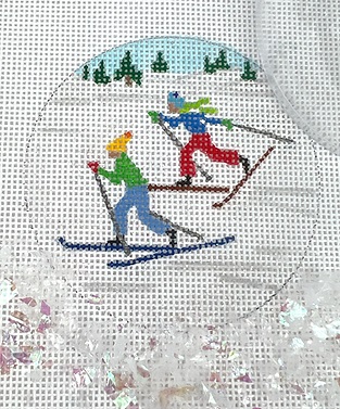 click here to view larger image of Cross Country Skiers Ornament w/Clear Dome and Confetti (hand painted canvases 2)